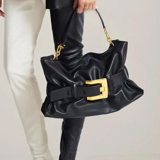 Luxuriöse Damenhandtasche aus weichem Leder. Krokodilmuster Faltentasche