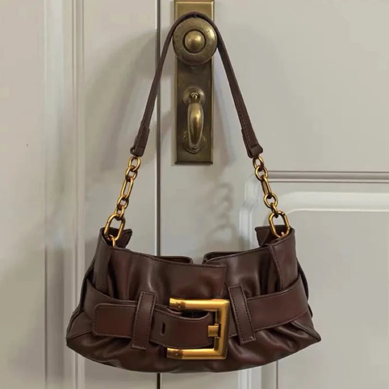 Luxuriöse Damenhandtasche aus weichem Leder. Krokodilmuster Faltentasche